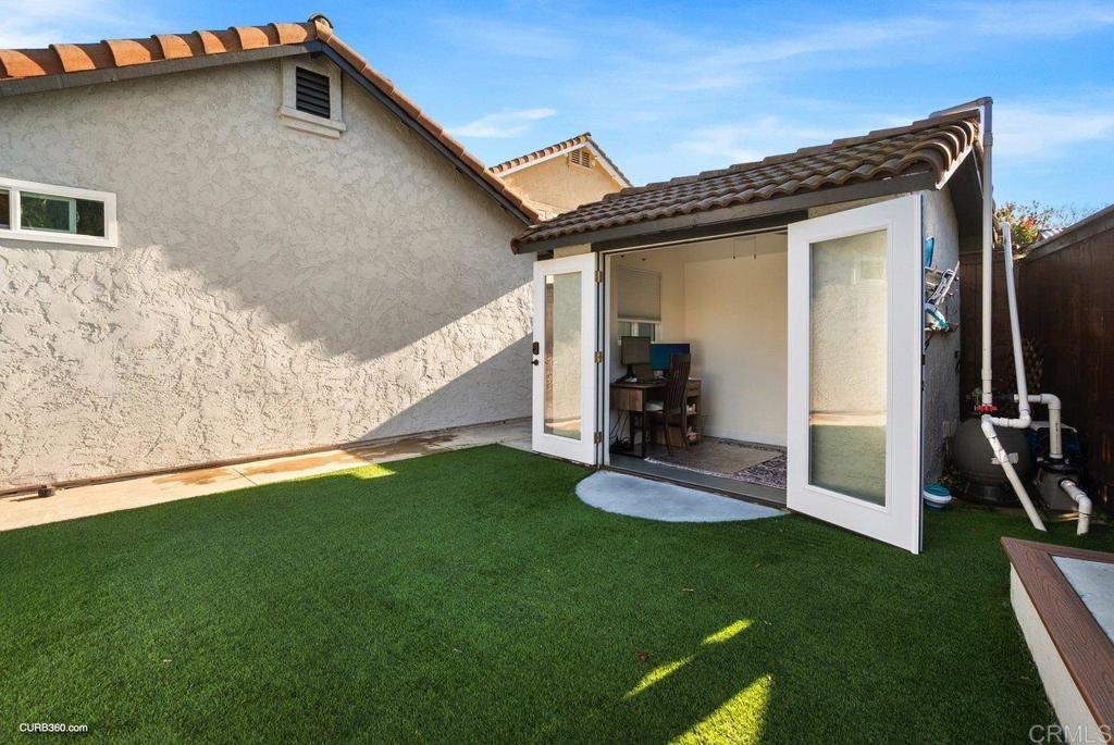 1963 Alderbrook Place Chula Vista, CA 91913 - Photo 25 of 30 a front view of a house with a yard