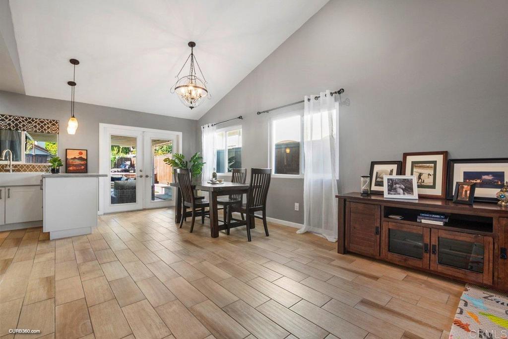 1963 Alderbrook Place Chula Vista, CA 91913 - Photo 4 of 30 a view of a dining room with furniture window and wooden floor