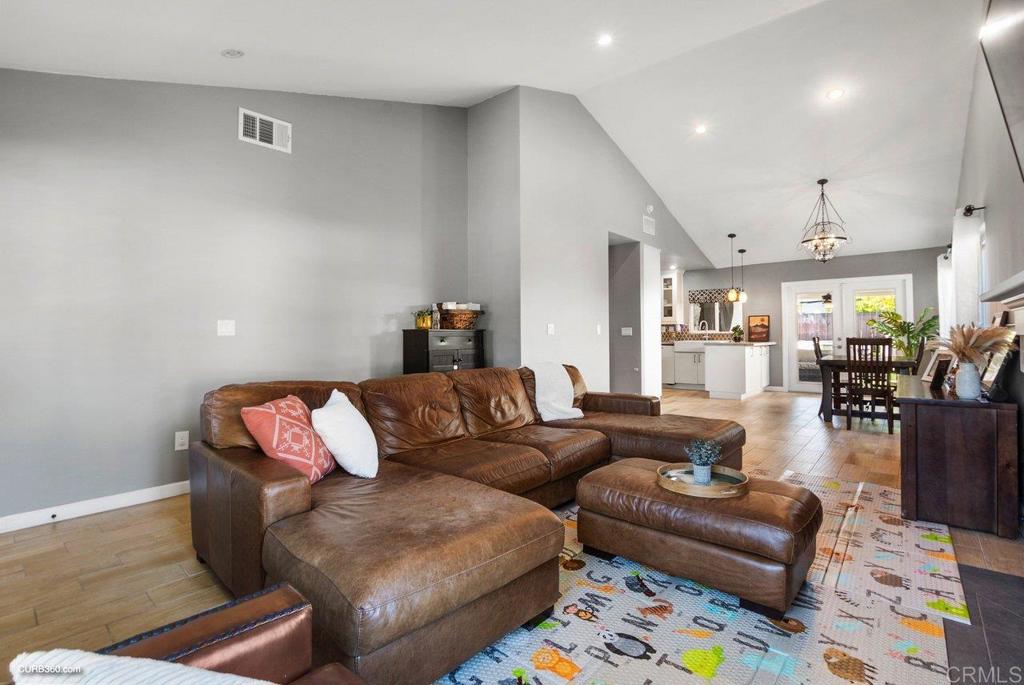 1963 Alderbrook Place Chula Vista, CA 91913 - Photo 5 of 30 a living room with furniture and wooden floor