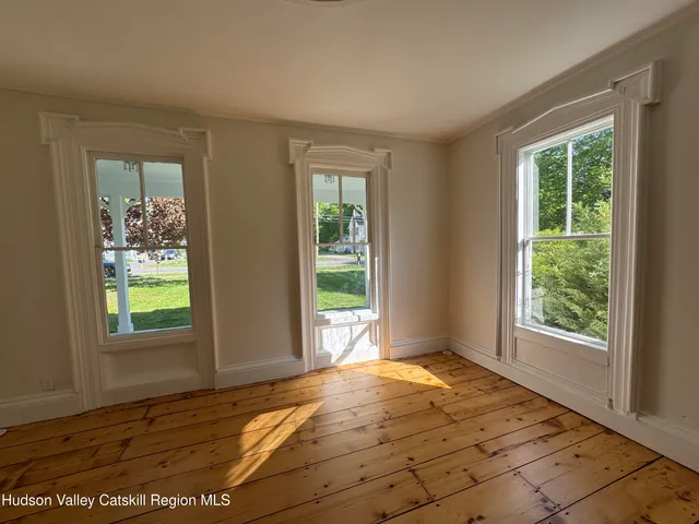a view of an empty room and window