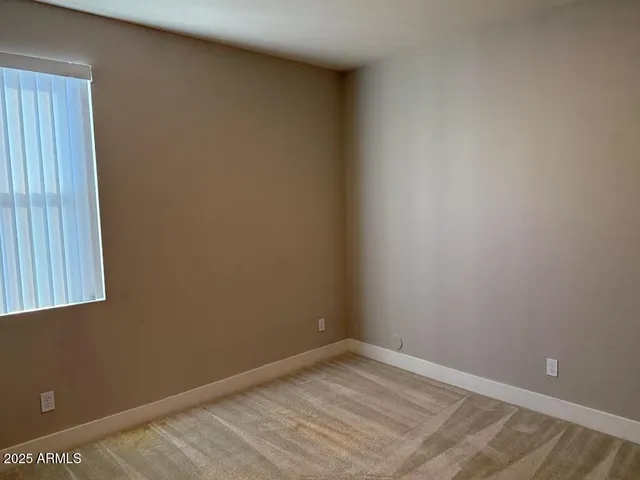 a view of a room with a window