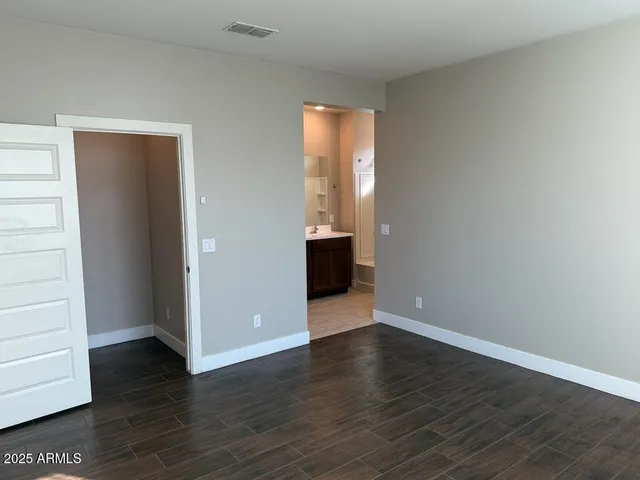 a view of an empty walk in closet
