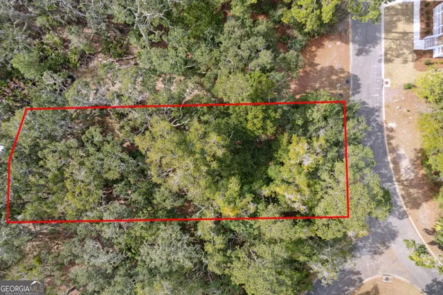 a view of a houses with a yard