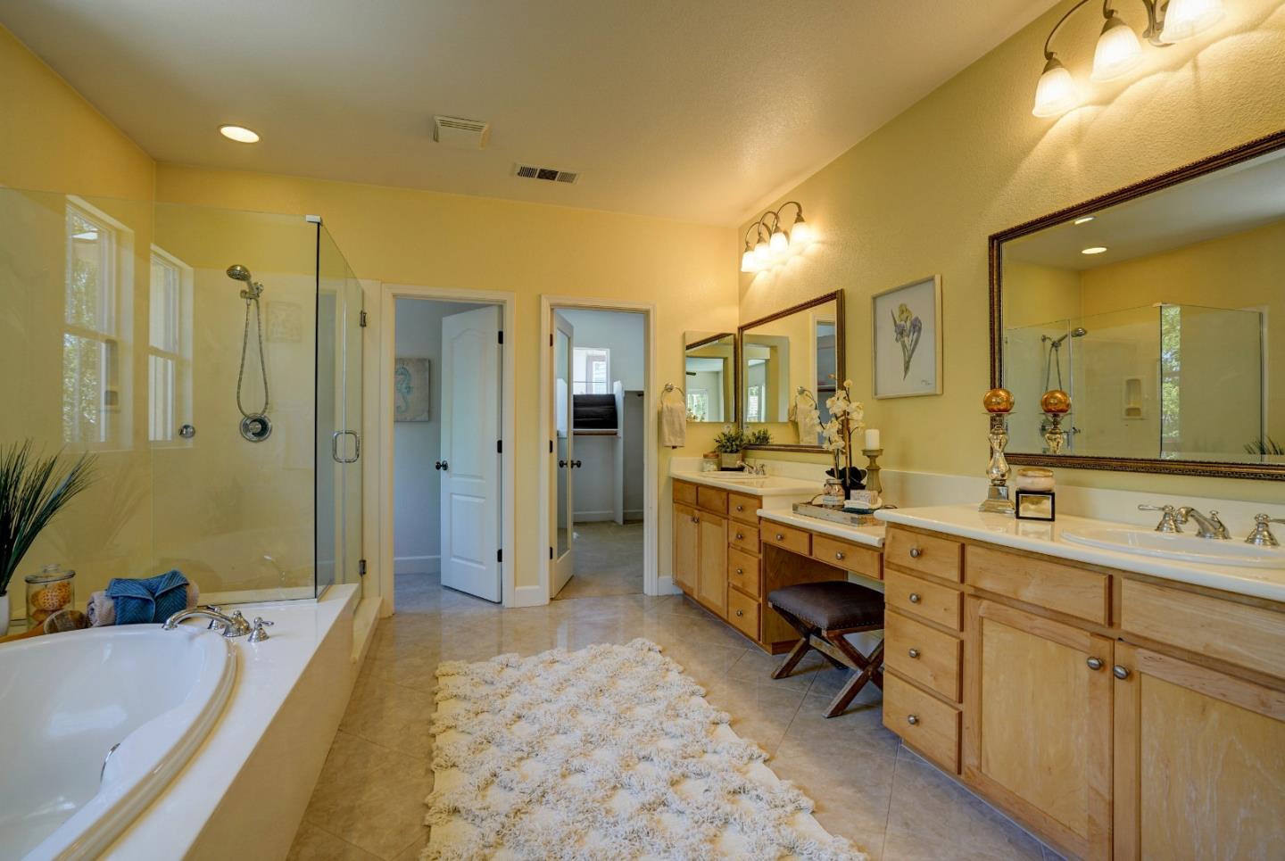 2915 Silva Way San Ramon, CA 94582 - Photo 28 of 38 a large bathroom with a tub a sink shower and a mirror