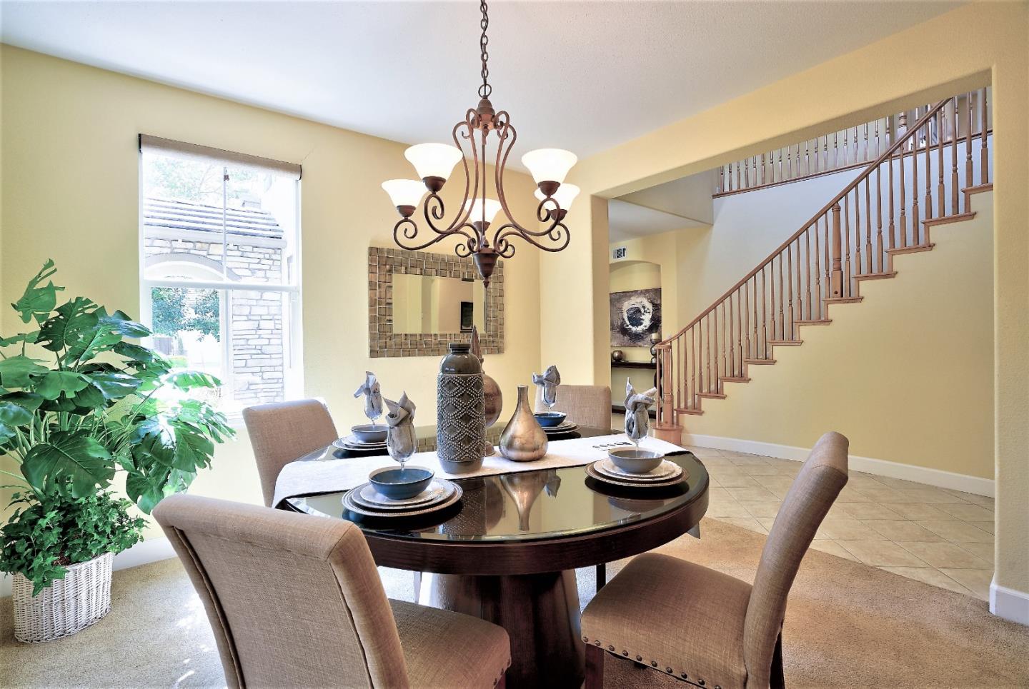 2915 Silva Way San Ramon, CA 94582 - Photo 8 of 38 a dining room with furniture a chandelier and window