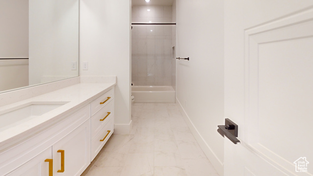 683 North Heritage Street Mapleton, UT 84664 - Photo 23 of 40 Full bathroom with vanity, marble look tile flooring, and tub / shower combination