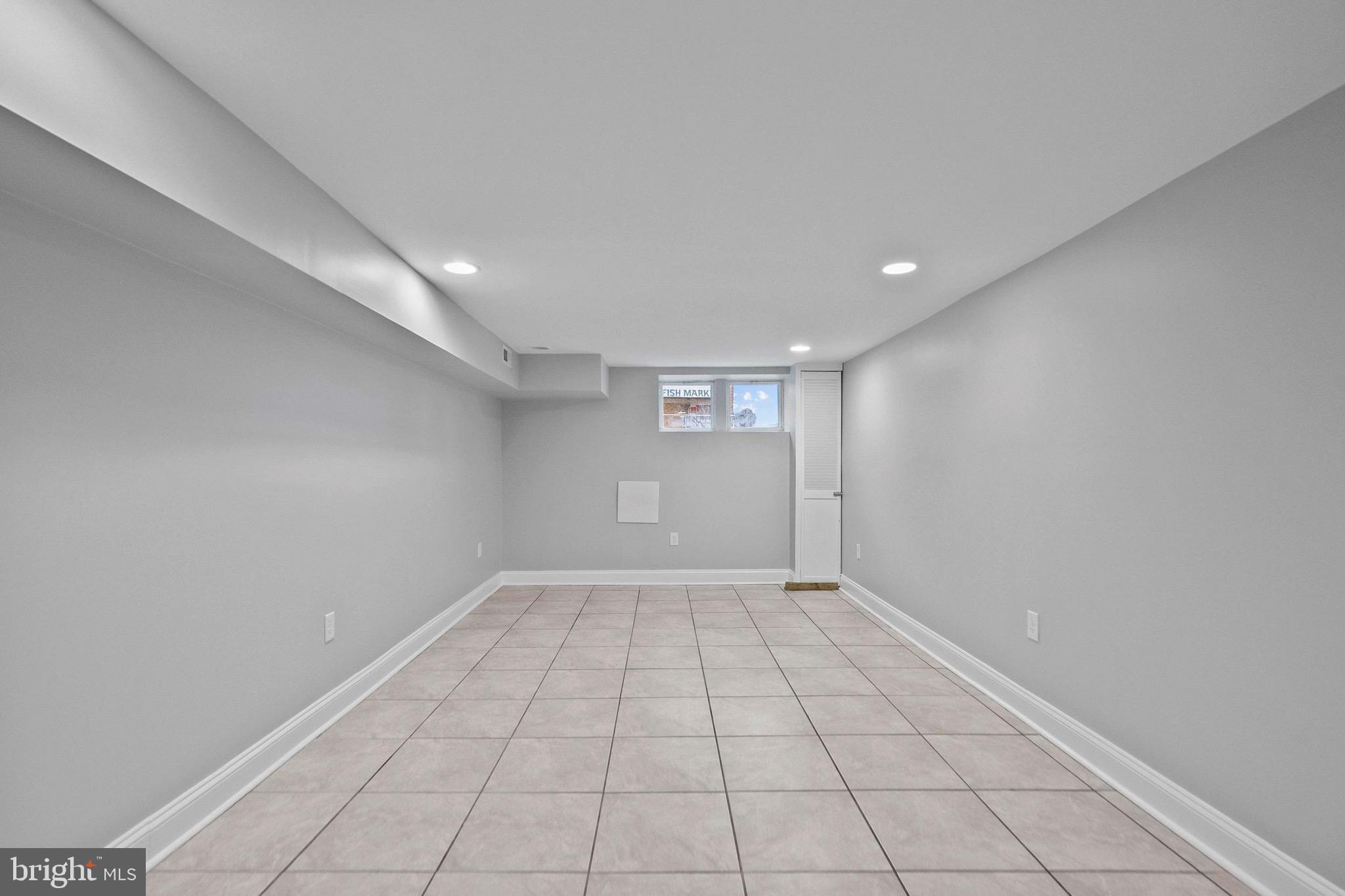 2706 Greenmount Avenue Baltimore, MD 21218 - Photo 17 of 20 wooden floor in an empty room