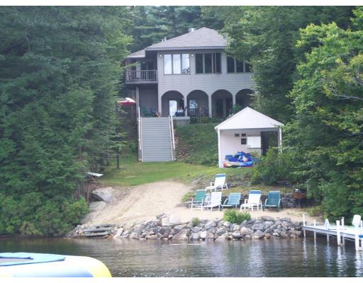 70 Stowell Road Ashburnham, MA 01430 - Photo 1 of 17 a front view of a house with swimming pool