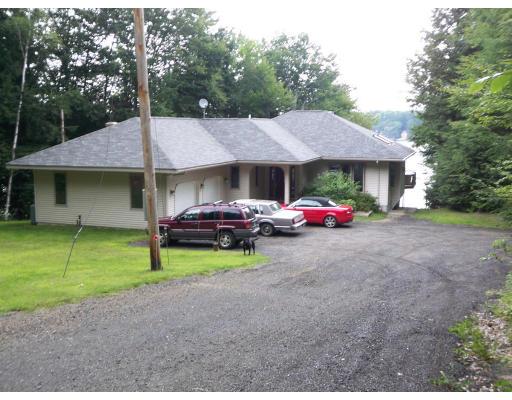 70 Stowell Road Ashburnham, MA 01430 - Photo 16 of 17 a front view of a house with garden