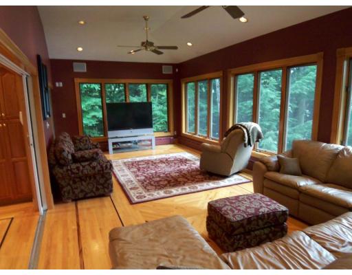 70 Stowell Road Ashburnham, MA 01430 - Photo 6 of 17 a living room with furniture and a flat screen tv