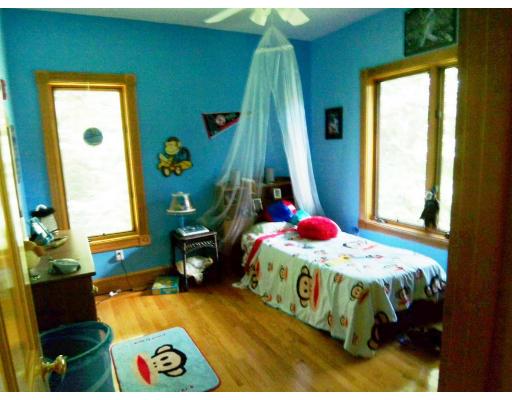 70 Stowell Road Ashburnham, MA 01430 - Photo 8 of 17 a bedroom with a bed and a window