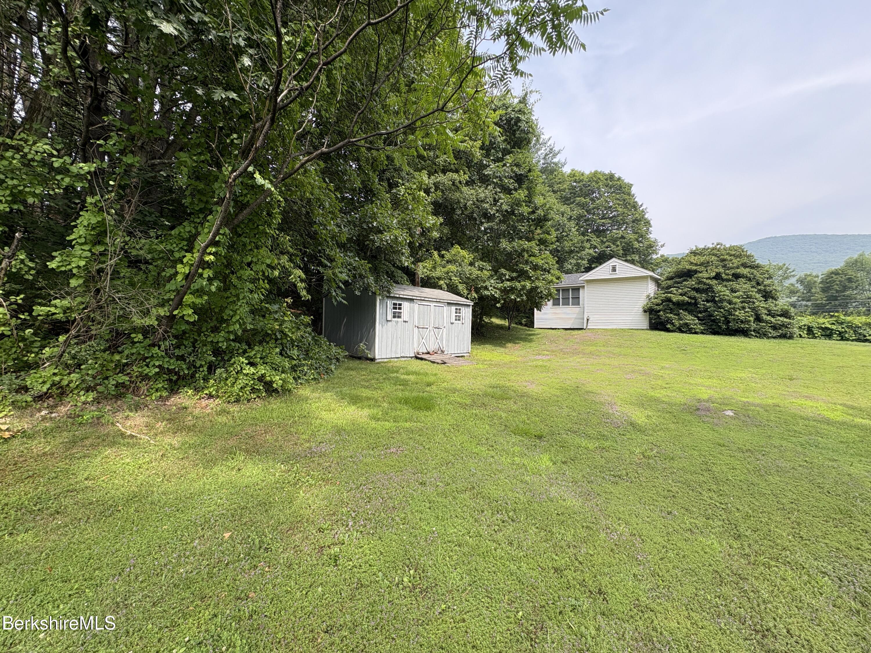 59 High Street West Stockbridge, MA 01236 - Photo 8 of 25 a house view with a garden space