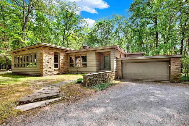 a view of a house with a garage