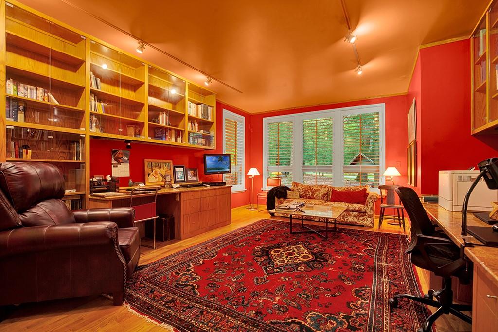 114 Forelle Lane Ligonier, PA 15658 - Photo 29 of 43 a living room with furniture a rug and a floor to ceiling window