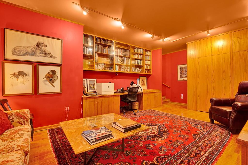 114 Forelle Lane Ligonier, PA 15658 - Photo 30 of 43 a living room with furniture a rug and a wall painting