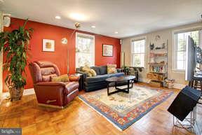 2719 Ordway Street Northwest, Unit 6 Washington, DC 20008 - Photo 2 of 12 a living room with furniture and a rug