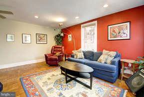 2719 Ordway Street Northwest, Unit 6 Washington, DC 20008 - Photo 4 of 12 a living room with furniture and a rug