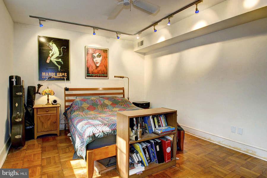 2719 Ordway Street Northwest, Unit 6 Washington, DC 20008 - Photo 9 of 12 a living room with couch and book shelf