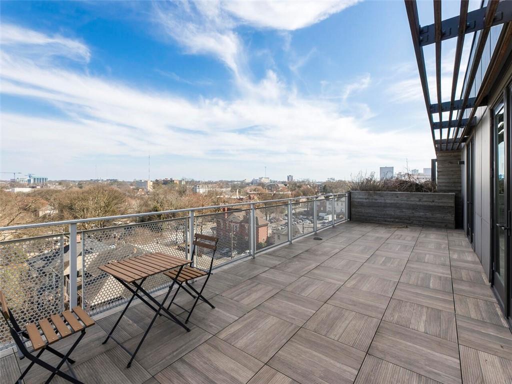 a view of a terrace with seating space