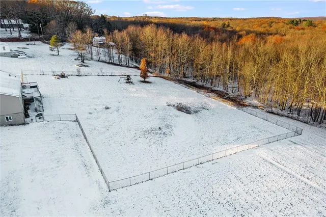 a bath tub sitting in middle of snow