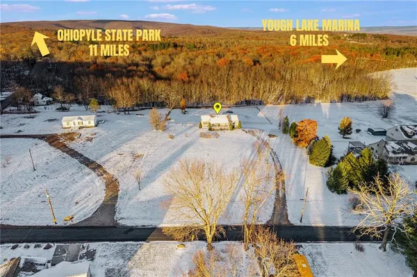 a view of a swimming pool with an outdoor seating