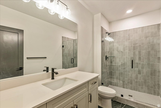 2458 West Aurora Avenue, Unit 287 Mapleton, UT 84664 - Photo 22 of 24 Full bath with a stall shower and vanity