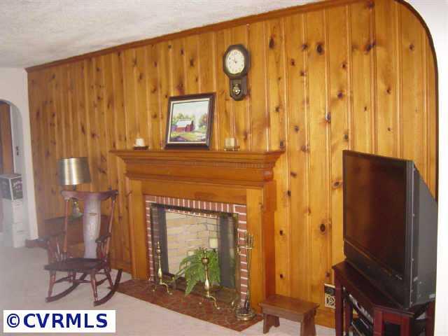 Other - Brick wood burning fireplace w/knotty pine