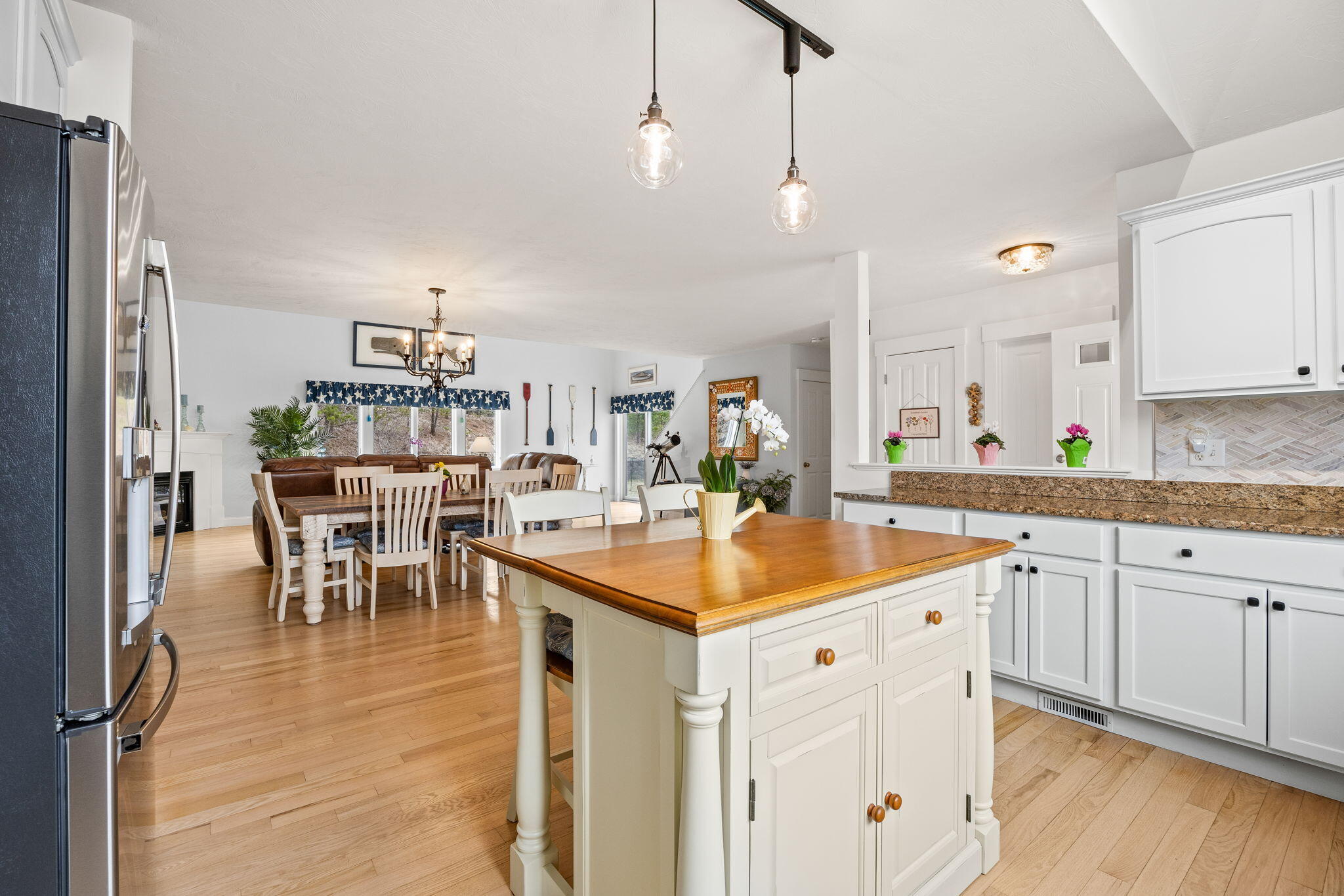 11 Aspen Road Buzzards Bay, MA 02532 - Photo 11 of 43 a open kitchen with stainless steel appliances granite countertop a sink and a refrigerator