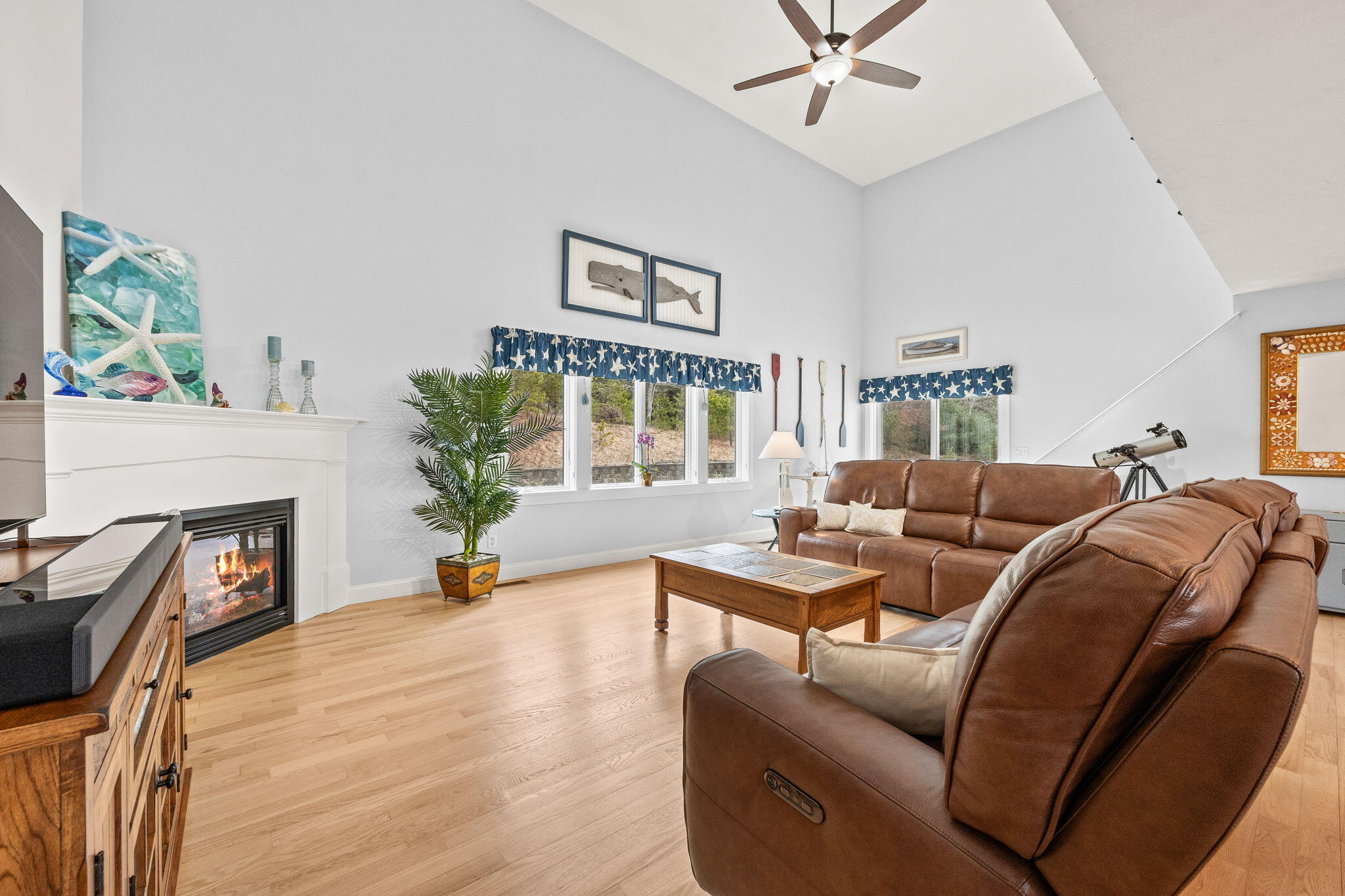 11 Aspen Road Buzzards Bay, MA 02532 - Photo 16 of 43 a living room with furniture and a fireplace