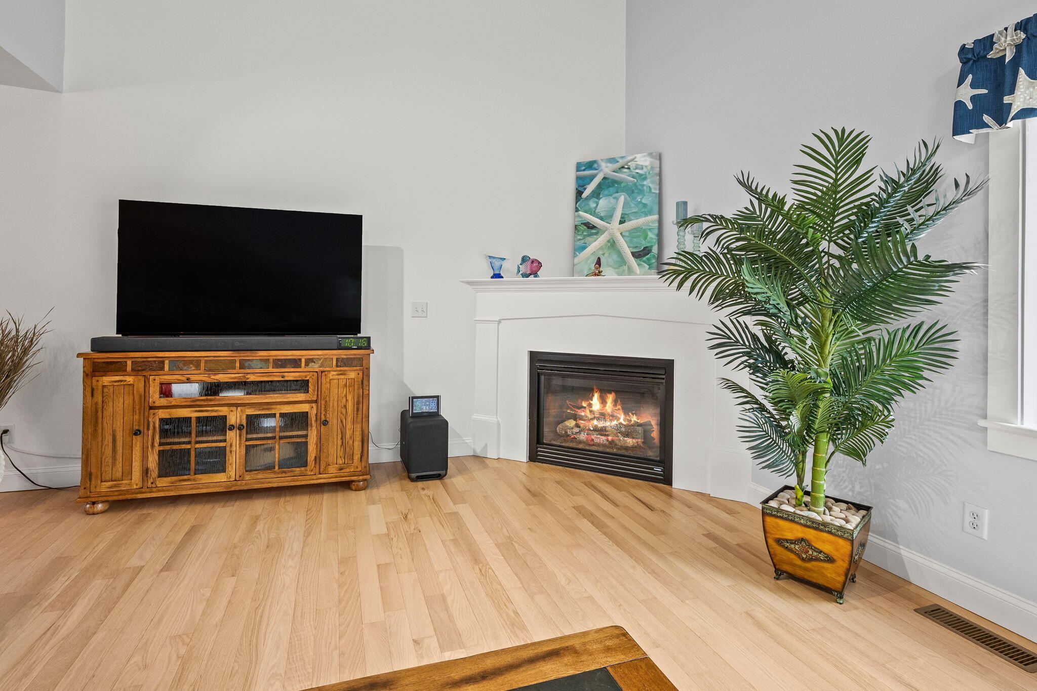 11 Aspen Road Buzzards Bay, MA 02532 - Photo 17 of 43 a living room with furniture and a fireplace