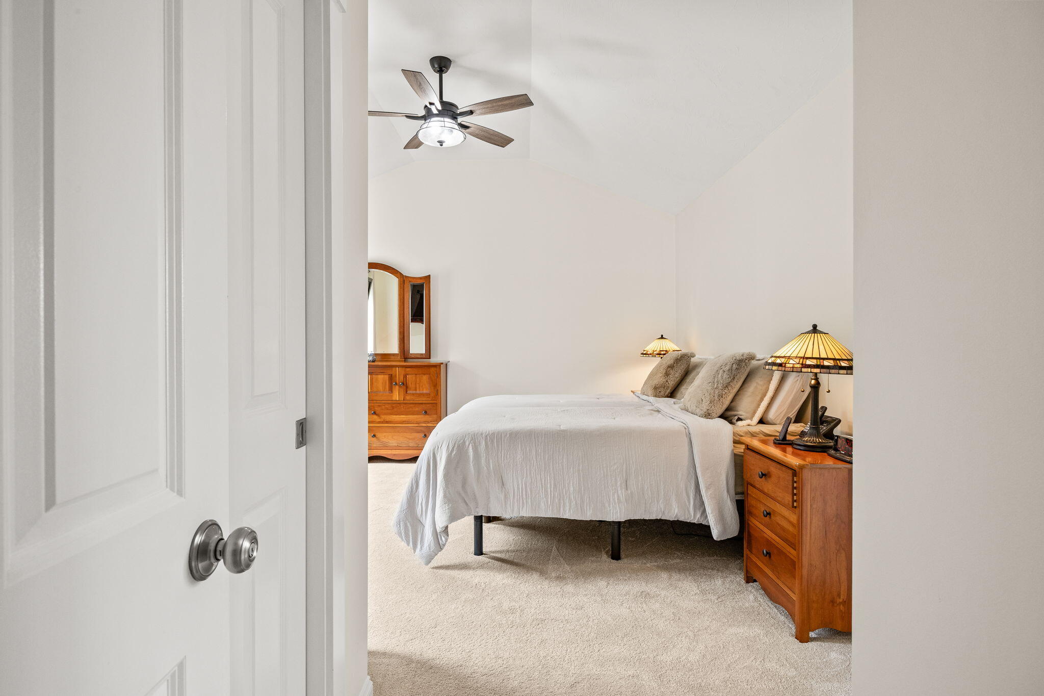 11 Aspen Road Buzzards Bay, MA 02532 - Photo 18 of 43 a bedroom with a bed and a chandelier