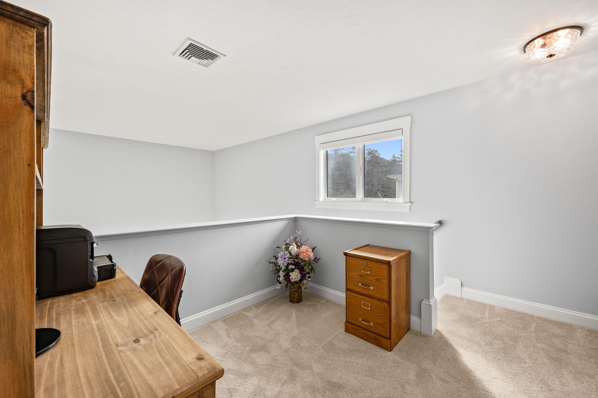 11 Aspen Road Buzzards Bay, MA 02532 - Photo 25 of 43 a room with furniture and a window