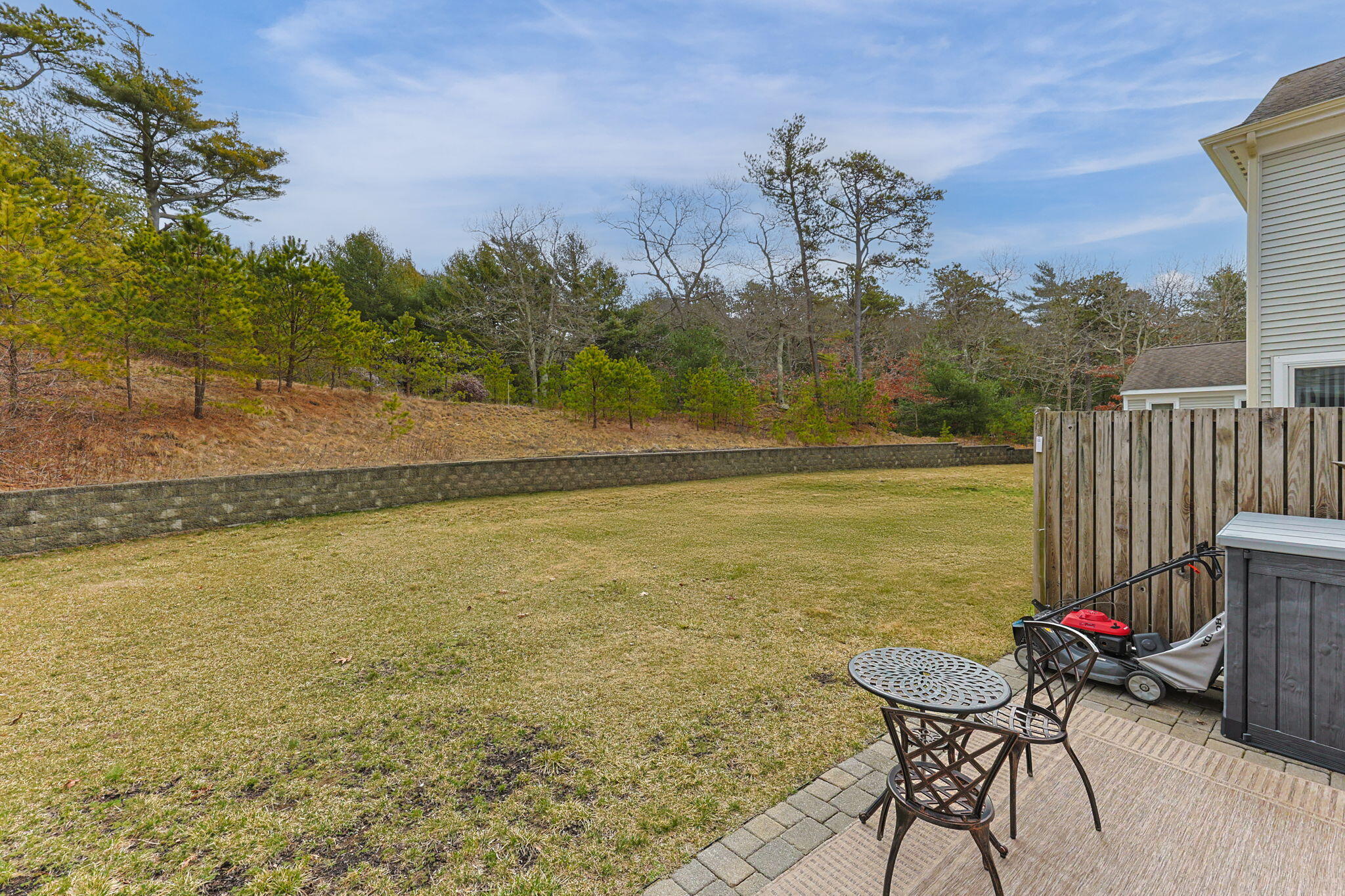 11 Aspen Road Buzzards Bay, MA 02532 - Photo 33 of 43 a view of a terrace with chair and table
