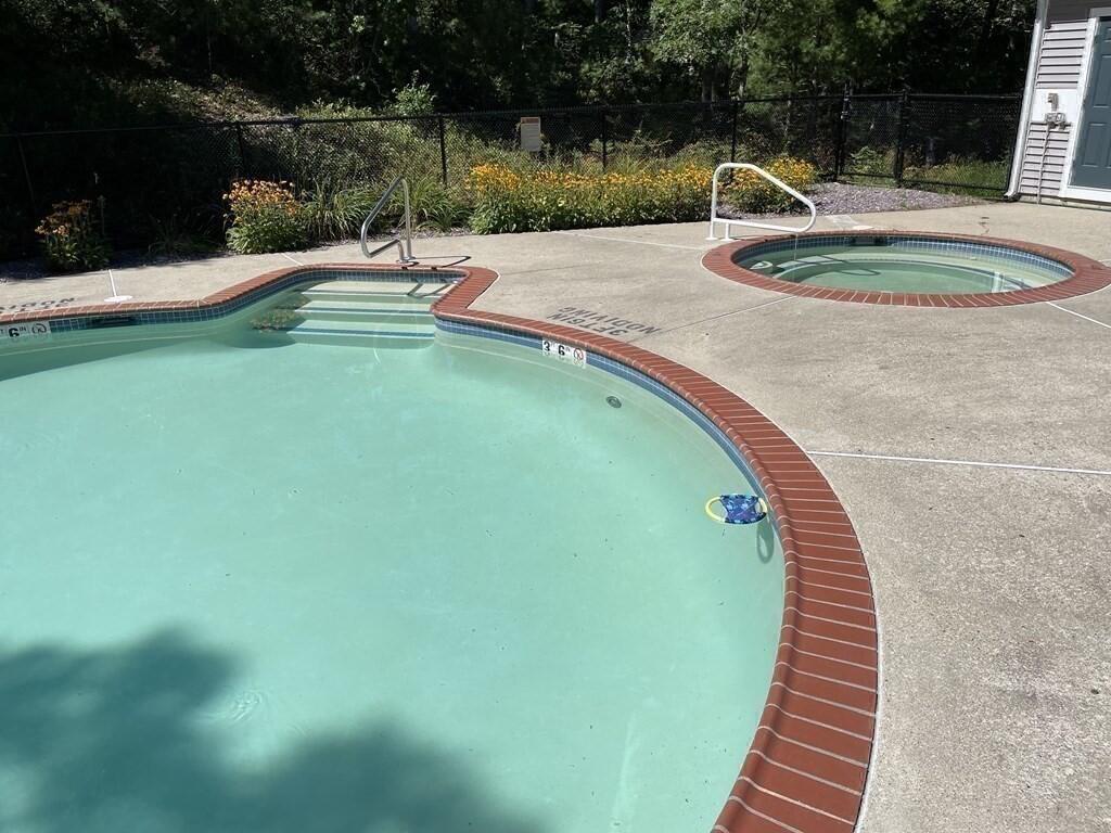 11 Aspen Road Buzzards Bay, MA 02532 - Photo 38 of 43 a view of a swimming pool with a garden