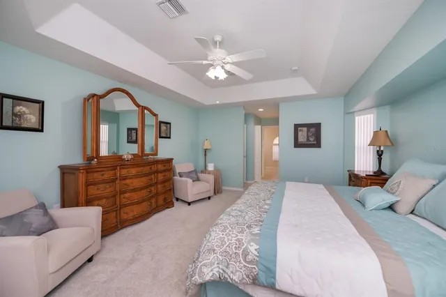 a bathroom with a sink a mirror and a window