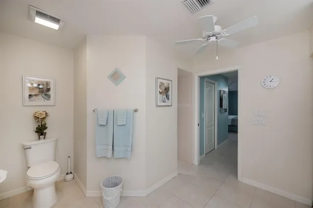 a view of a lake with houses in background