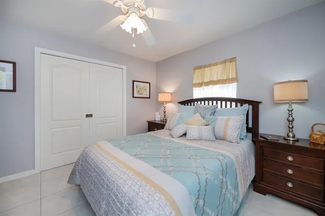 an aerial view of a residential houses with outdoor space