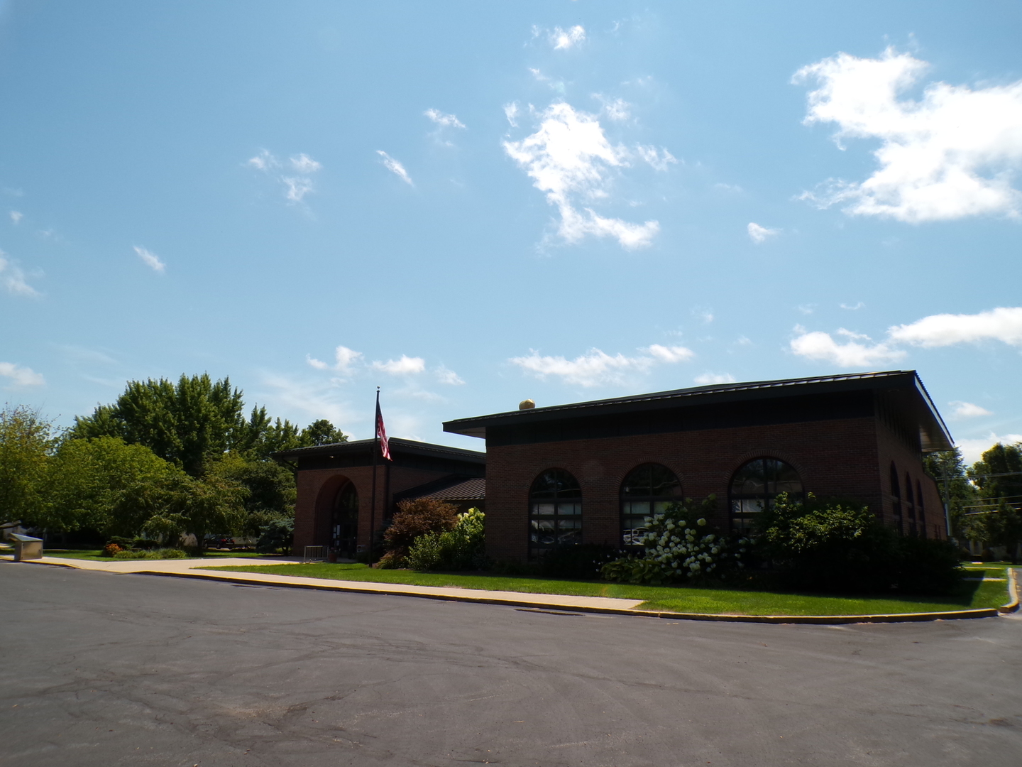 304 South Madison Street Morrison, IL 61270 - Photo 9 of 9 a view of a house with a yard and a garage