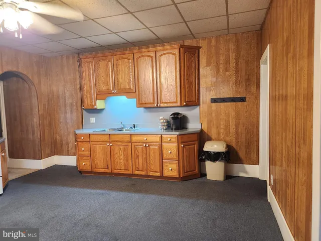 a kitchen with a sink and a cabinets