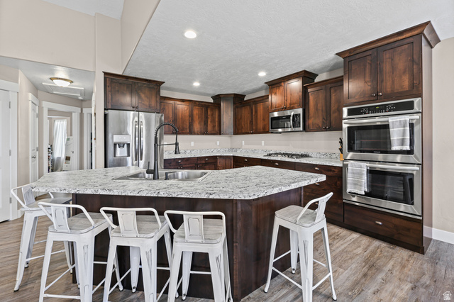 712 East Sunset View Road Grantsville, UT 84029 - Photo 14 of 44 Large island with lots of seating