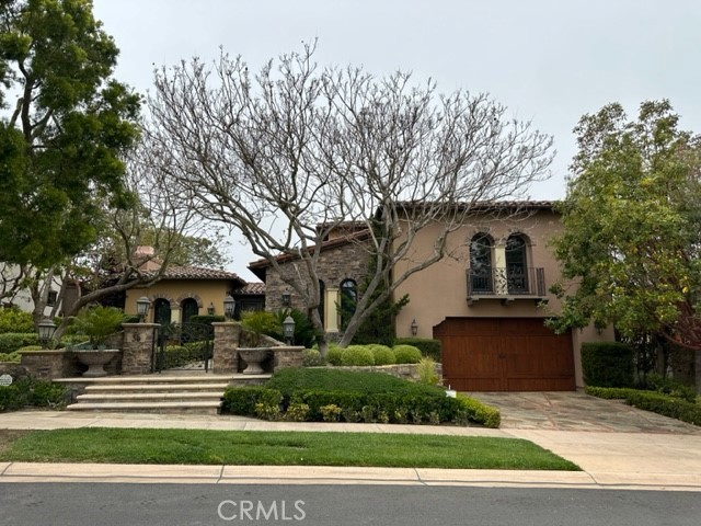 35 Overlook Drive Newport Coast, CA 92657 - Photo 1 of 3 a front view of a house with a garden
