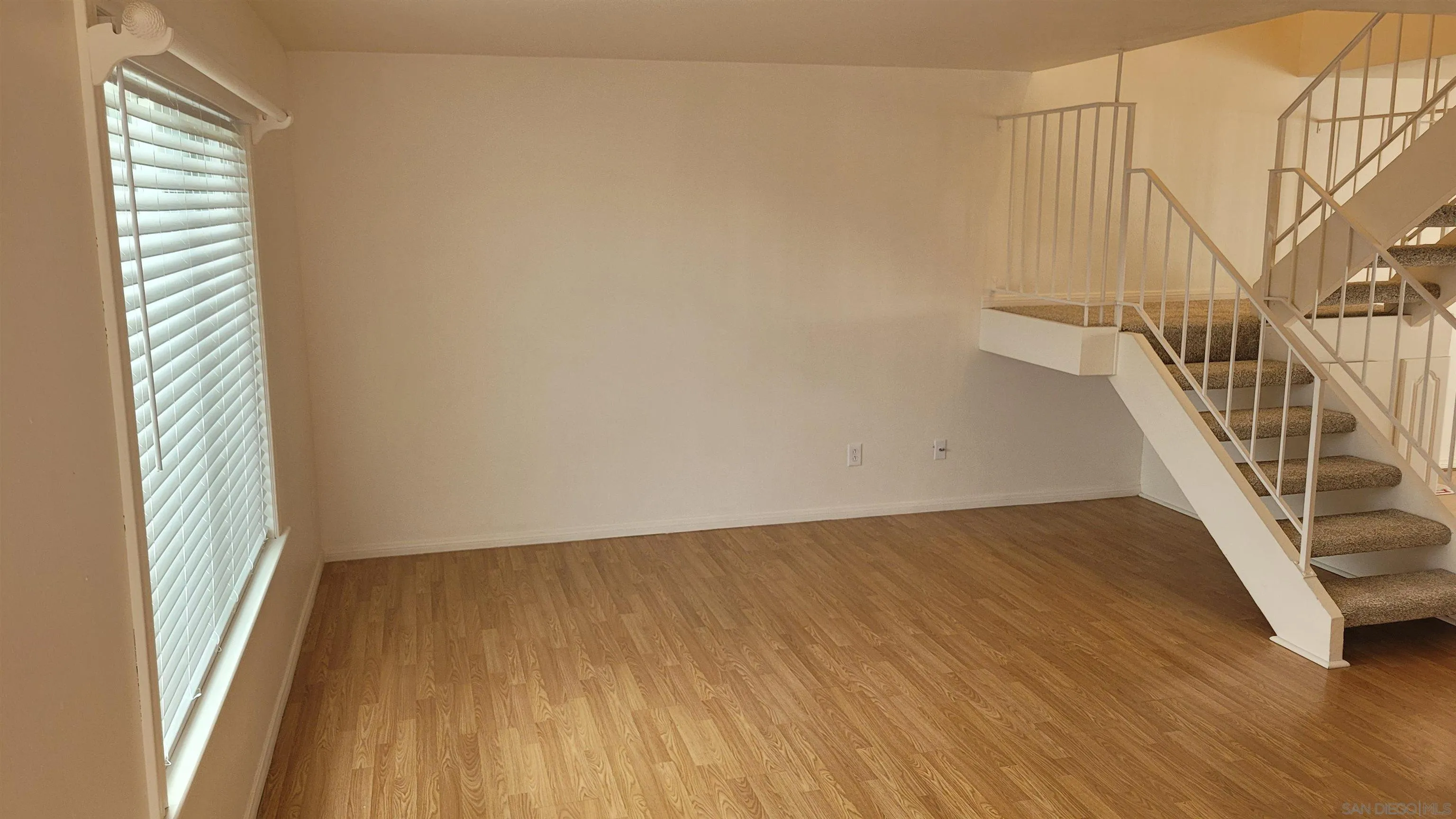 863 Del Mar Downs Road, Unit D Solana Beach, CA 92075 - Photo 6 of 23 a view of entryway with wooden floor