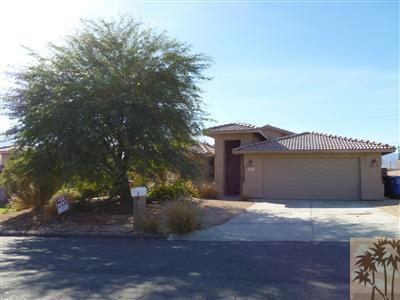 10575 San Pablo Road Desert Hot Springs, CA 92240 - Photo 2 of 2 a view of a house with a yard