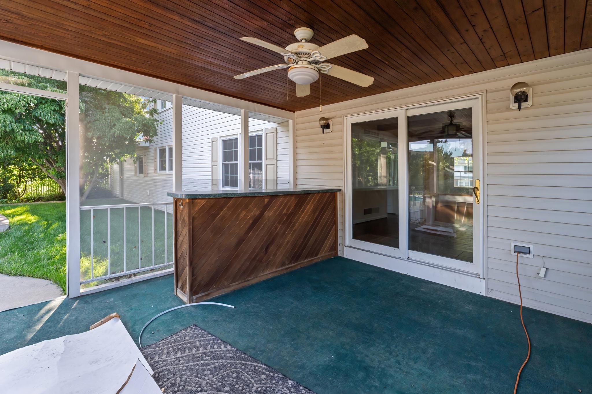 22 Pogue Avenue Rising Sun, MD 21911 - Photo 42 of 44 Lovely screened in porch retreat with dry bar!