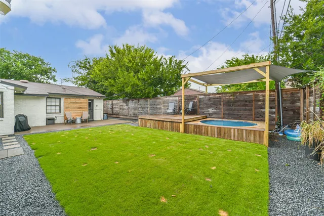 a view of outdoor space and swimming pool