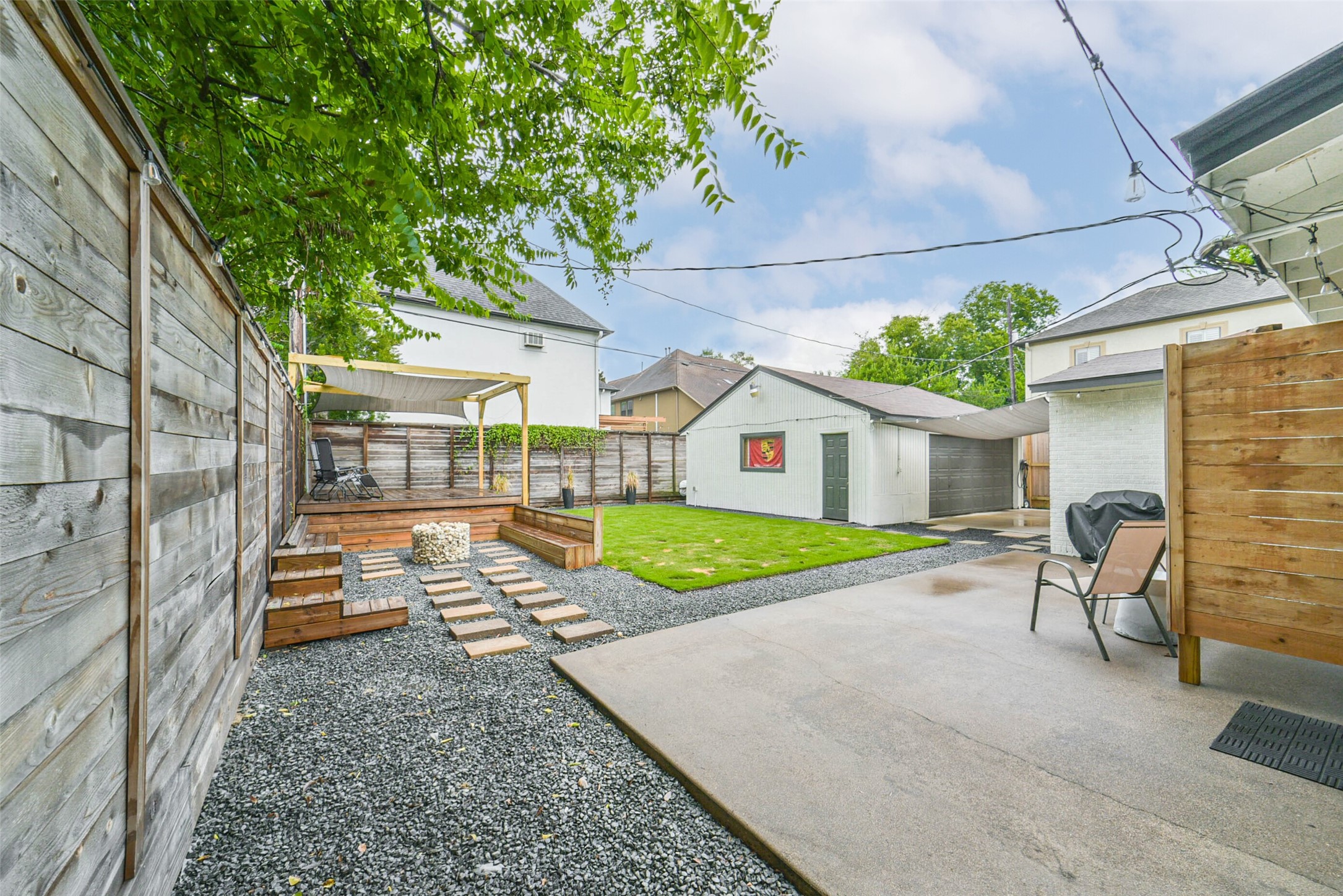 6205 South Rice Avenue Bellaire, TX 77401 - Photo 16 of 21 a view of backyard with swimming pool