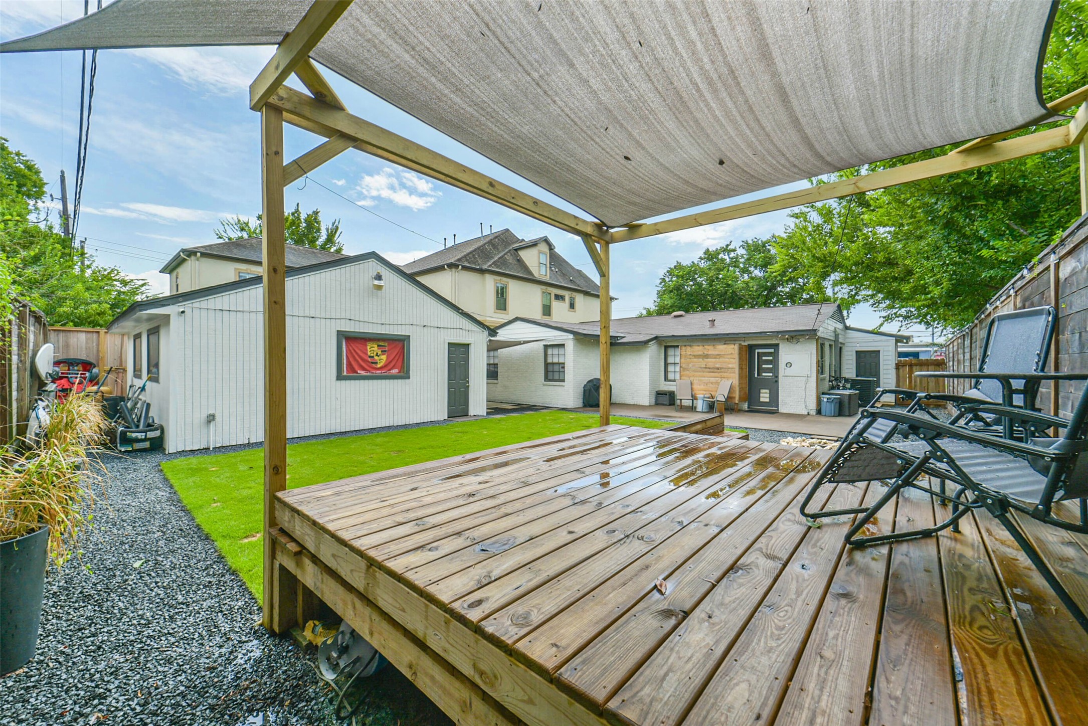 6205 South Rice Avenue Bellaire, TX 77401 - Photo 19 of 21 a view of house with backyard and pool