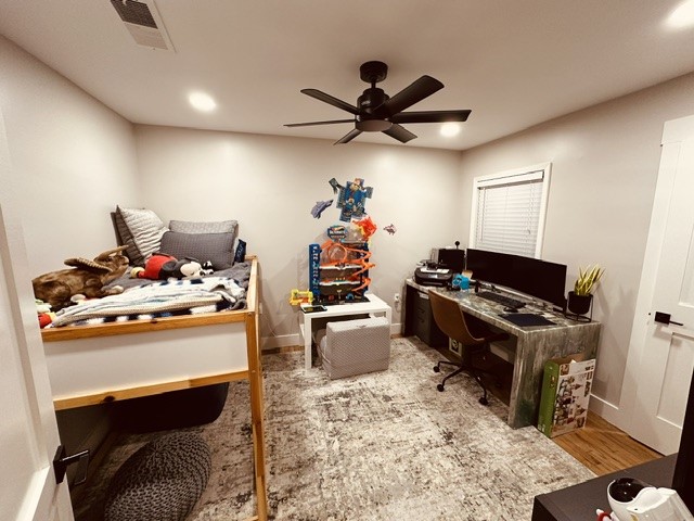 6205 South Rice Avenue Bellaire, TX 77401 - Photo 7 of 21 a living room with furniture and a wooden floor