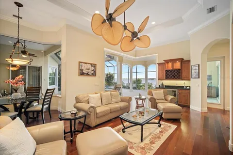 a spacious bedroom with a bed and a couch