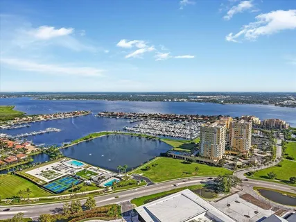 an aerial view of a house with a lake view